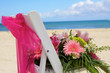 flower arrangement on a white chair