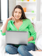 happy woman with laptop computer
