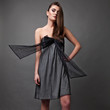 Photo: woman in a black dress. woman in a black dress.