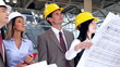 Architect and a group of engineers.