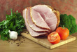 Ham and vegetables on a kitchen table.