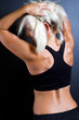 fitness woman rear view over black background fitness woman rear view over black background