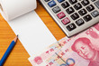 Blank list with Chinese money,calculator and pencil
