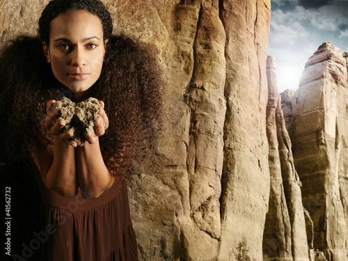 Photo: Woman holding earth Woman holding earth