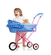 Photo: happy girl with baby carriage and kitten inside happy girl with baby carriage and kitten inside