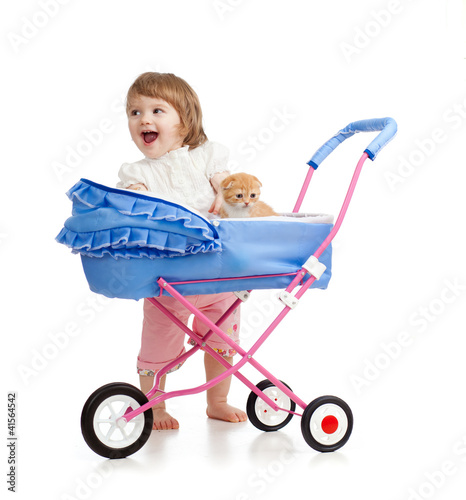 Photo: happy girl with baby carriage and kitten inside happy girl with baby carriage and kitten inside