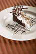 Sacher cake with whipped cream and chocolate