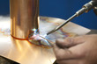 Installateur mit Kupfer