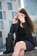 Business woman calling phone - problems Business woman calling phone - problems