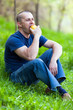 Man eating an apple outdoor Man eating an apple outdoor