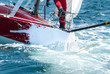 skipper on bow at regatta