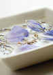 Petals and dried lavender floating in dish
