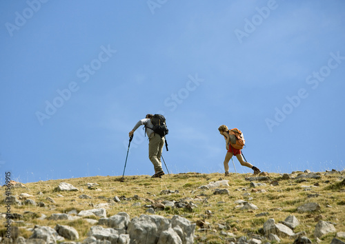 Photo: Hikers on mountainous landscape Hikers on mountainous landscape