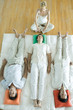 Photo: Alternative therapy session, three adults lying side by side while therapist puts hands out over man's head Alternative therapy session, three adults lying side by side while therapist puts hands out over man's head
