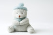 Teddy bear wearing hat, missing one eye