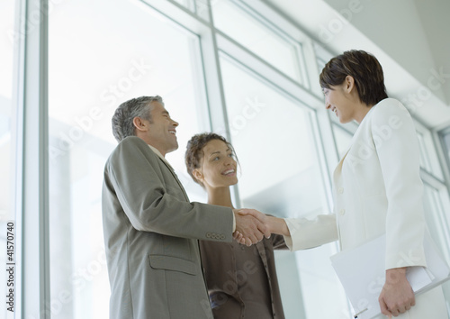 Photo: Business people shaking hands Business people shaking hands