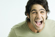 Man, mouth wide open and eyebrows raised, portrait