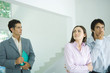 Real estate agent showing house to hesitant young couple
