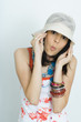 Teenage girl wearing hat, looking at camera, wide eyes