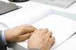 Professional man reading Braille, cropped view of hands