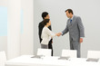 Business associates shaking hands