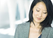 Businesswoman smiling and looking down