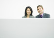 Businessman and businesswoman side by side