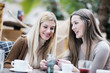 cute smiling women drinking a coffee