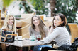 cute smiling women drinking a coffee