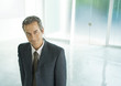 Businessman in lobby, portrait