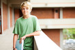 cute high school boy in school building