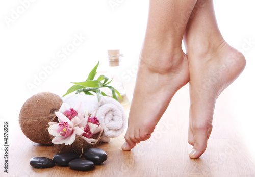 Photo: Beautiful legs and different spa items Beautiful legs and different spa items