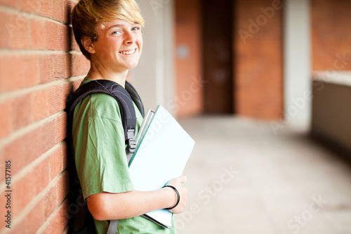 Photo: happy middle school boy in school happy middle school boy in school
