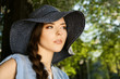 Woman in blue hat