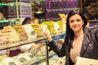 Girl in Istanbul candy shop
