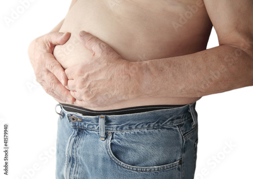 Photo: bare-chested man with stomach ache bare-chested man with stomach ache