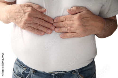 Photo: a man feels pressure in the center of his chest a man feels pressure in the center of his chest