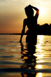 Silhouette of a woman at the beach
