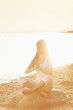 yoga lotus meditation position front to seaside