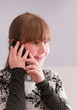 Girl smiling and talk on telephone Girl smiling and talk on telephone