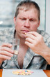 Man taking pills