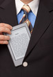 Photo: e-Reader, ebook wird aus dem Sakko gezogen e-Reader, ebook wird aus dem Sakko gezogen