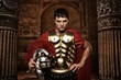 Roman soldier against antique building.