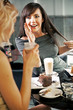 Two women chatting in a coffee shop