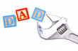 Father's Day - Wooden blocks spelling DAD with wrench Father's Day - Wooden blocks spelling DAD with wrench