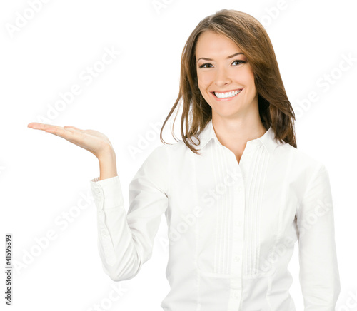 Photo: Business woman showing, isolated Business woman showing, isolated