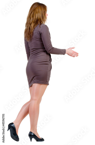 Photo: handshake in walking woman's. handshake in walking woman's.