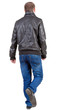 Back view of going  handsome man in jacket.  walking young guy i