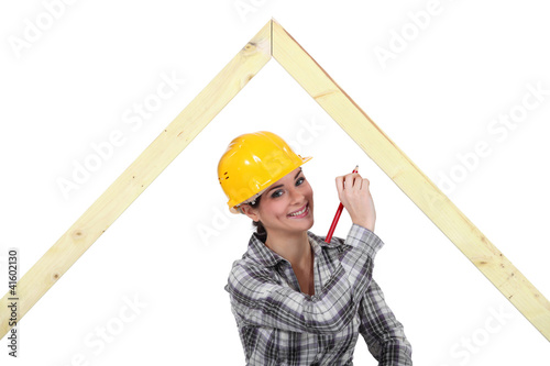 Photo: female carpenter working female carpenter working