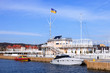 Marina to the pier from the city flag on the mast in Sopot